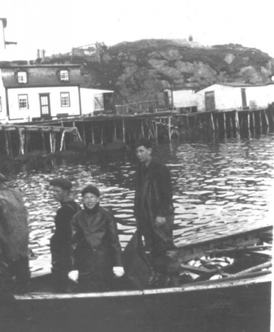 195: Boys returning from fishing, l-r Pat Dunphy, Kevin Carroll, Joe Dunphy. Leo Whelan's  house in background. (circa 1946)  - Pat and Joe sons of Thomas Dunphy &amp;amp; Anastasia Carroll; Kevin son of Michael Carroll &amp;amp; Josephine Barry